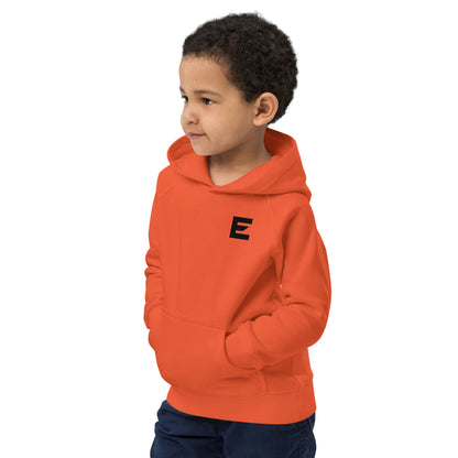 Zwarte kruisvorm met het woord “TRUST” als christelijk ontwerp voor een kinderhoodie van Evertrue, geïnspireerd op Psalm 28